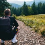 hiking shoes and backpack on trail に関連するアウトドア写真